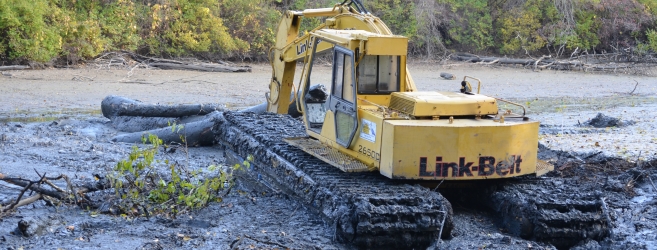 <p>Specialized equipment like this floating excavator was used throughout the project to access hard to reach areas </p>