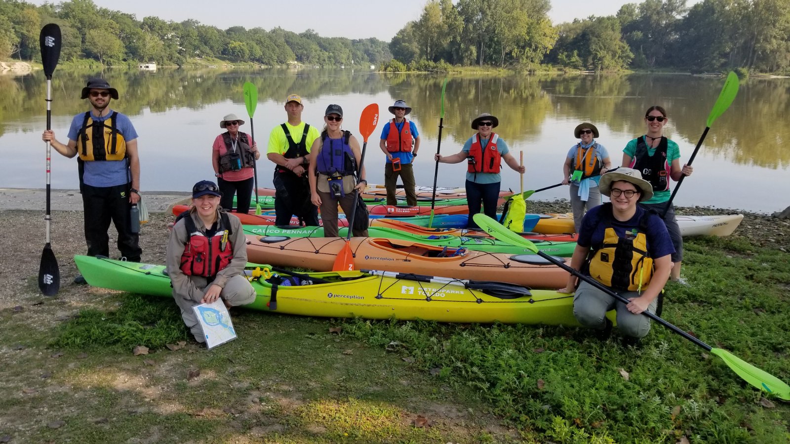 Members of the Maumee Area of Concern Advisory Committee paddle the Maumee River.