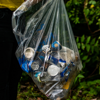 Three images side-by-side. From left: anglers participating in the Walleye Run. A walleye fish caught on a line. A tangle of fishing line removed from a Partners for Clean Streams recycling bin.