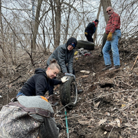 Volunteers on a CYS 365 clean-up at Forest Cemetery on March 2022.