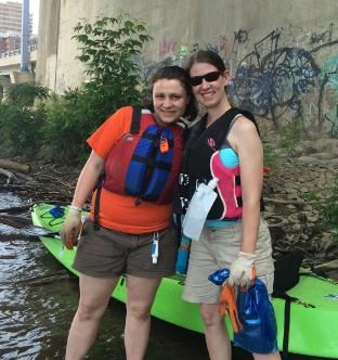 Kris and Ava cleaning at River Rally in Pittsburgh