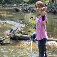 One young Clean Your Streams 365 volunteer holds up a strange find.